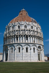 Fototapeta premium The Baptistery of St. John, Piazza del Duomo (Cathedral Square) also known as Piazza dei Miracoli (Square of Miracles), Pisa, Tuscany, Italy
