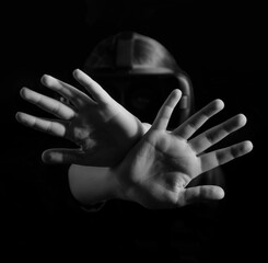 serious, unhappy, confident young child teenager teen girl female kid holding two arms hands...