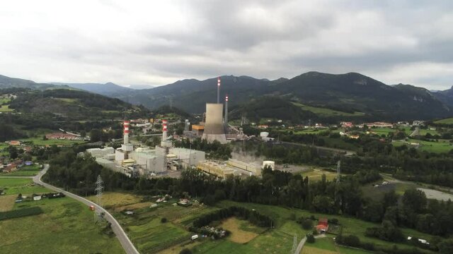 Chemical industry in beautiful valley of Oviedo. Asturias, Spain. Aerial Drone Footage
