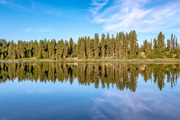 nature reflections at wilderness lake in washington state
