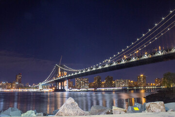 Obraz premium Manhattan Bridge from Brooklyn with construction going on the back.