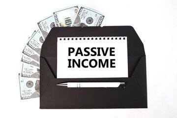 US dollars in black envelope isolated on white background. magnifier on white sheet. space for text on the right