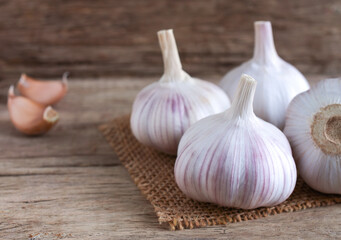 Fresh garlic on wooden background,copy space.