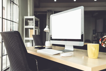 Empty computer monitor screen for design mock up template in modern small office interior or home...