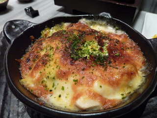 Close up shot of delicious grilled seafood with cheese