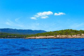 View from the boat to the shore. Adventure travel concept with wanderlust feelings.