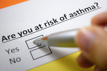 A person is answering question about asthma.