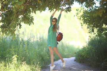 blonde summer city park walk beautiful / view beautiful young woman in urban environment outside concept vacation