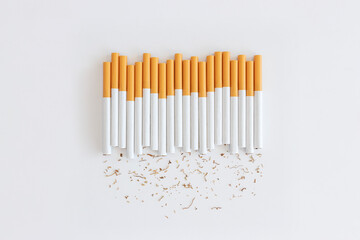 Top view, Cigarettes place on white background, Concept quitting or No smoke, World no tobacco day.