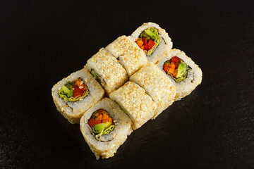 Japanese food: Set of salmon sushi and rolls with salmon and eel