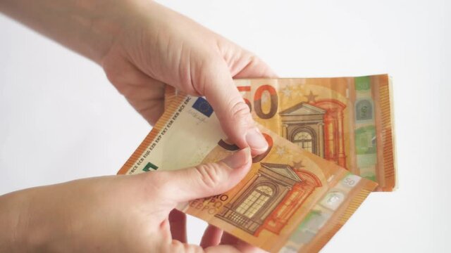 White caucasian woman giving euro money