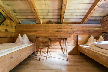 Holiday in the mountains: Rustic old wooden interior of a cabin or alpine hut