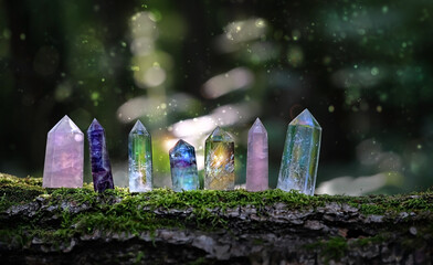 gemstones crystal minerals on mysterious nature background. gems fluorite, pink and clear quartz....