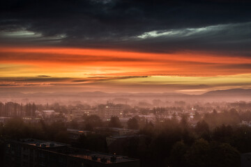 colorful foggy dark blue orange sunset in Ostrava