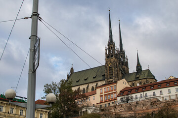 Fototapeta na wymiar old antique cathedral contrast with new city power line