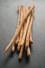 Traditional italian snack - grissini on concrete surface