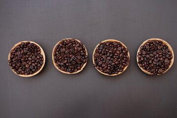 coffee cup and coffee beans on old wood table background, space for text