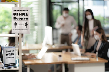 Office reopen with social distance signage - 370306952
