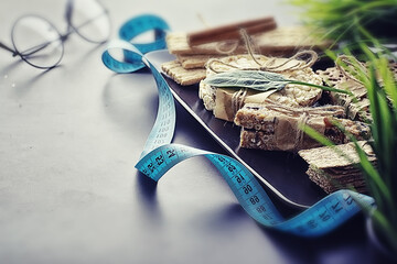 Tilt shift effect.Concept of losing weight and a healthy lifestyle. Bread roll with vegetables and...