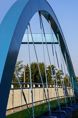 Fototapeta premium the bent blue ark of the iron bridge