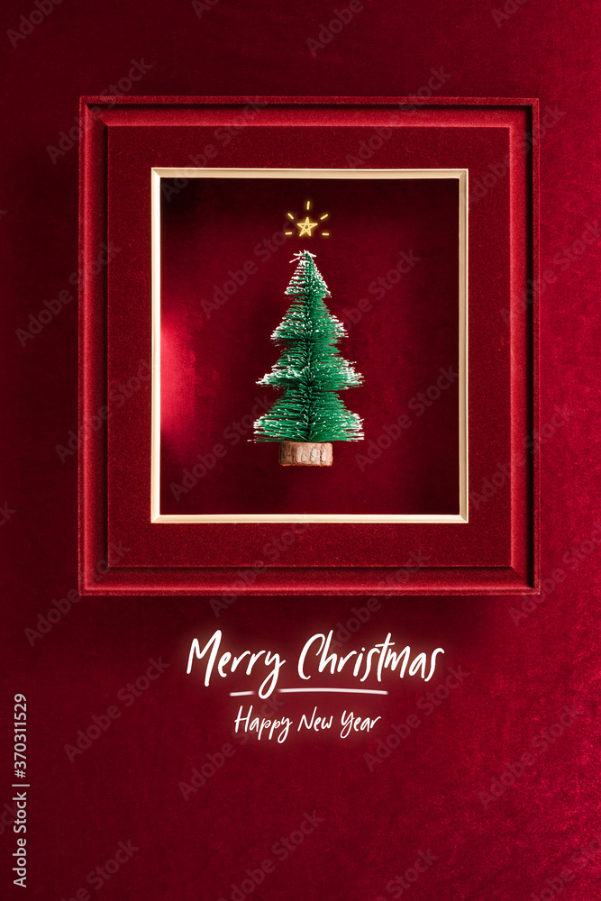 Poster merry christmas and happy new year text and christmas tree in felt photo frame on velvet red felt fa