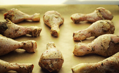 Baked chicken in the oven. Turkey legs on a baking sheet with spices baked in the oven. Snack on Thanksgiving Day.