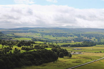 Obraz premium Stirling, Scotland - August 1, 2020, cute houses and fields in a small town in the countryside
