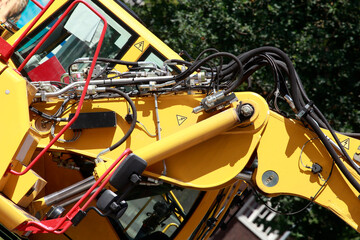 Fototapeta premium Hydraulischer Baggerarm eines Baggers auf einer Baustelle, Deutschland, Europa