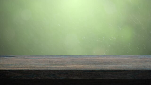 green bokeh background and wooden table