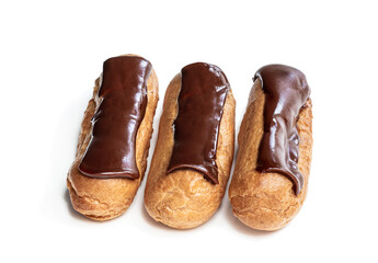 Chocolate eclairs isolated on white background