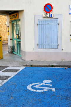 France, Rhone-Alpes, Provencal Drome, car parking space reserved for disabled person in Saou village.