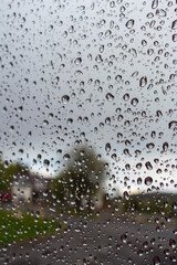 drops of water on the glass on a rainy day, glass with drops of water