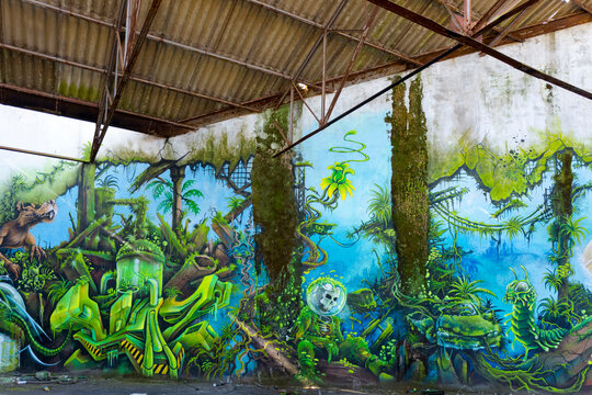 Europe, France, Bretagne, Morbihan, Lorient, murals of an abandoned warehouse in the port zone
