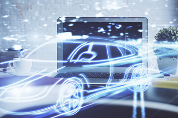 Desktop computer background in office with automobile hologram drawing. Multi exposure. Tech concept.