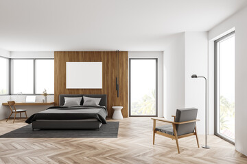 White bedroom with poster and home office