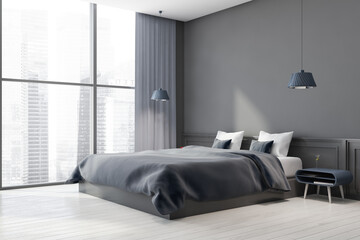 Grey bedroom interior with vertical poster
