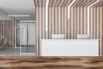 Table in blurry office with reception