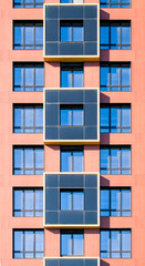 Exterior of modern architecture in the city center. Construction abstract background. Detail of the facade with windows.