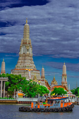 Fototapeta premium background of important religious attractions in Bangkok (Wat Phra Chetuphon (Wat Pho - reclining Buddha), a large pagoda and beautiful sculptural art give future generations to explore its history