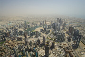 Fototapeta na wymiar Dubai skyscrapers from above. Incredible Dubai view. Futuristic skyline.