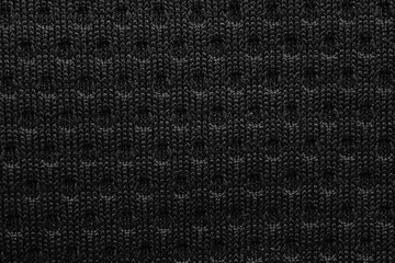 Rolgordijnen Black sports clothing fabric football shirt jersey texture close up © Piman Khrutmuang