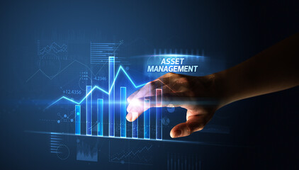 Hand touching ASSET MANAGEMENT button, business concept