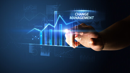 Hand touching CHANGE MANAGEMENT button, business concept