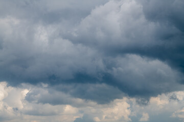 Cloudy gloomy sky, clouds, inclement weather, cumulus clouds.