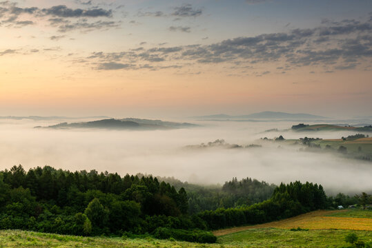 Hills in Morning Fog at Sunrise in Lesser Poland