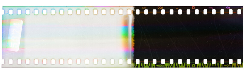 Beginning of 35mm negative film strip, first frame on white background, real scan of film material with funny scanning light interferences on the film material.
 - obrazy, fototapety, plakaty