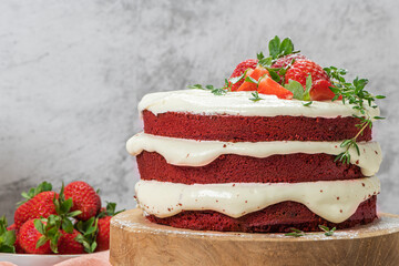Red velvet cake on wood board. Strawbwrry cake. Devils cake. Wedding dessert. Birthday party. Delicious dessert. Traditional american dessert.