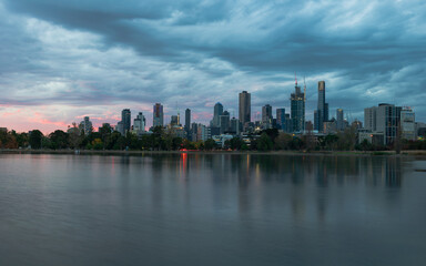 Fototapeta na wymiar Moody Melbourne sunset at Albert Park Lake