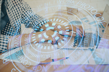 Businessman working on Laptop with technology theme drawing. Concept of big data. Double exposure.