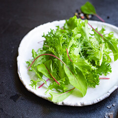 Healthy salad leaves mix salad micro greens, juicy snack. food background keto or paleo diet raw